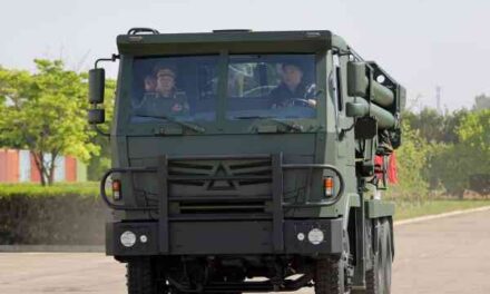N. Korean Leader Visits Major Defense Industrial Enterprises, Drives Launcher Vehicle